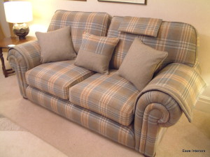 A beautiful high end upholstered sofa in wool fabric.
