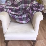 Old solid wing chair