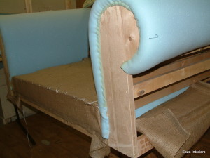 re-upholstery Arm being built up with first foam layer.